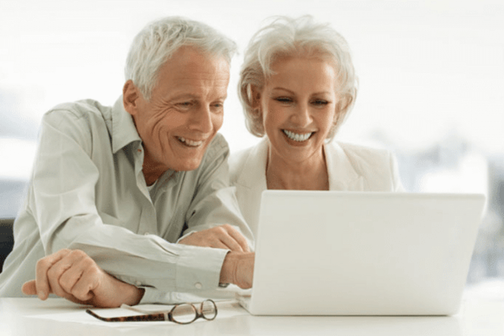 Senior couples with laptop 1